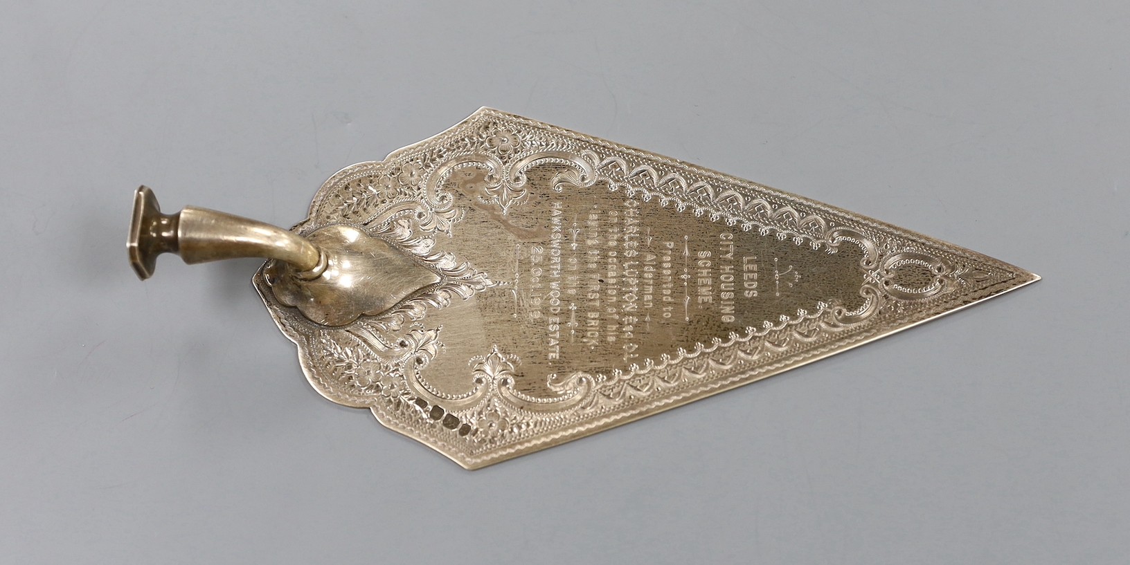 A late Victorian engraved silver presentation trowel, Sheffield, 1897, with later engraved inscription, no handle, 19.5cm, 153 grams.